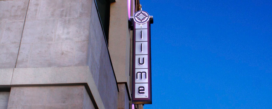 Illuminated signage detail on a mixed-use development