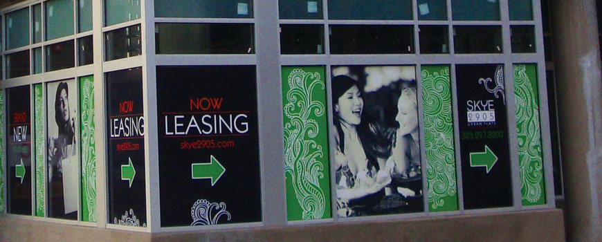 Large-format leasing graphics applied to a storefront